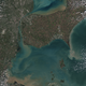 Sediments swirl in Lake Erie and Lake St. Clair in this Landsat 9 image of both Detroit, Michigan, and Windsor, Ontario, from Oct. 31, 2021.